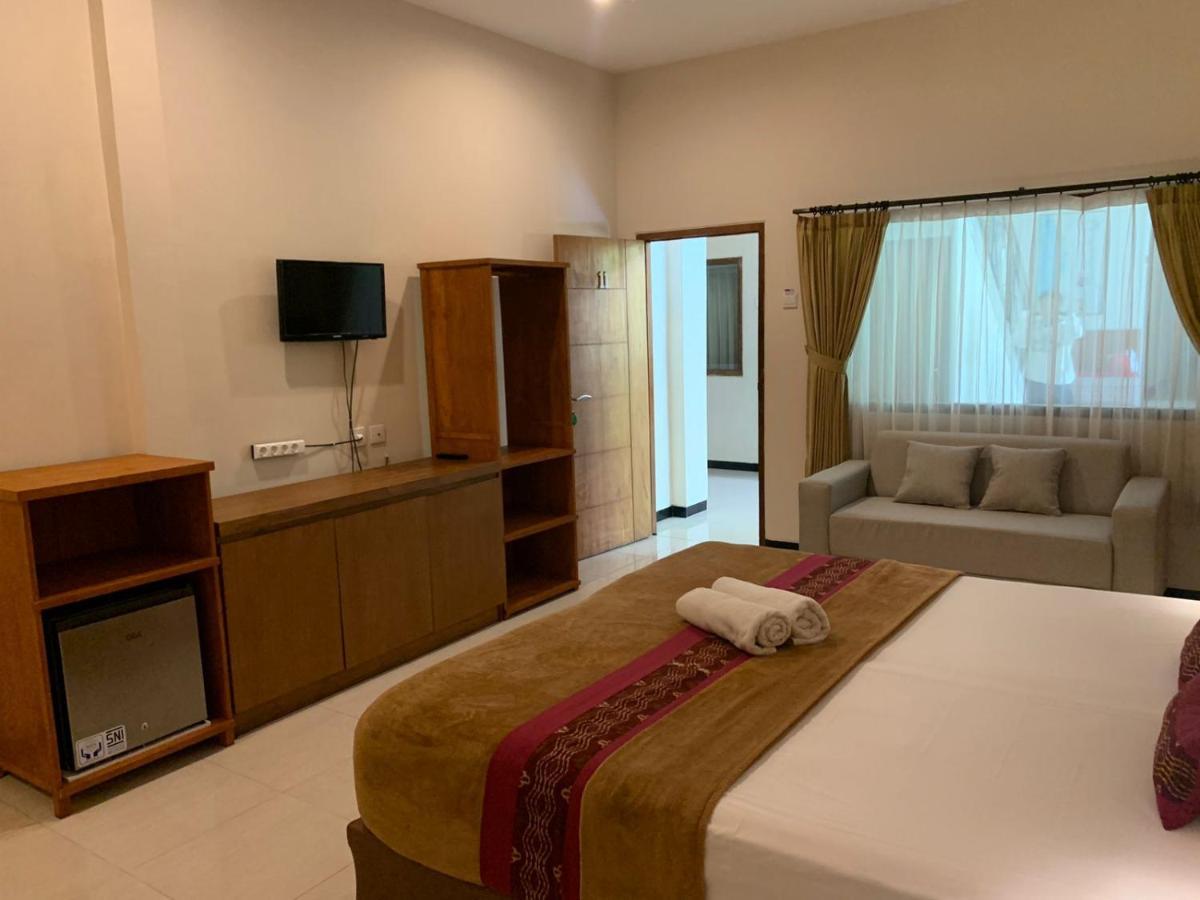 Kuta Suci Guesthouse Екстер'єр фото
