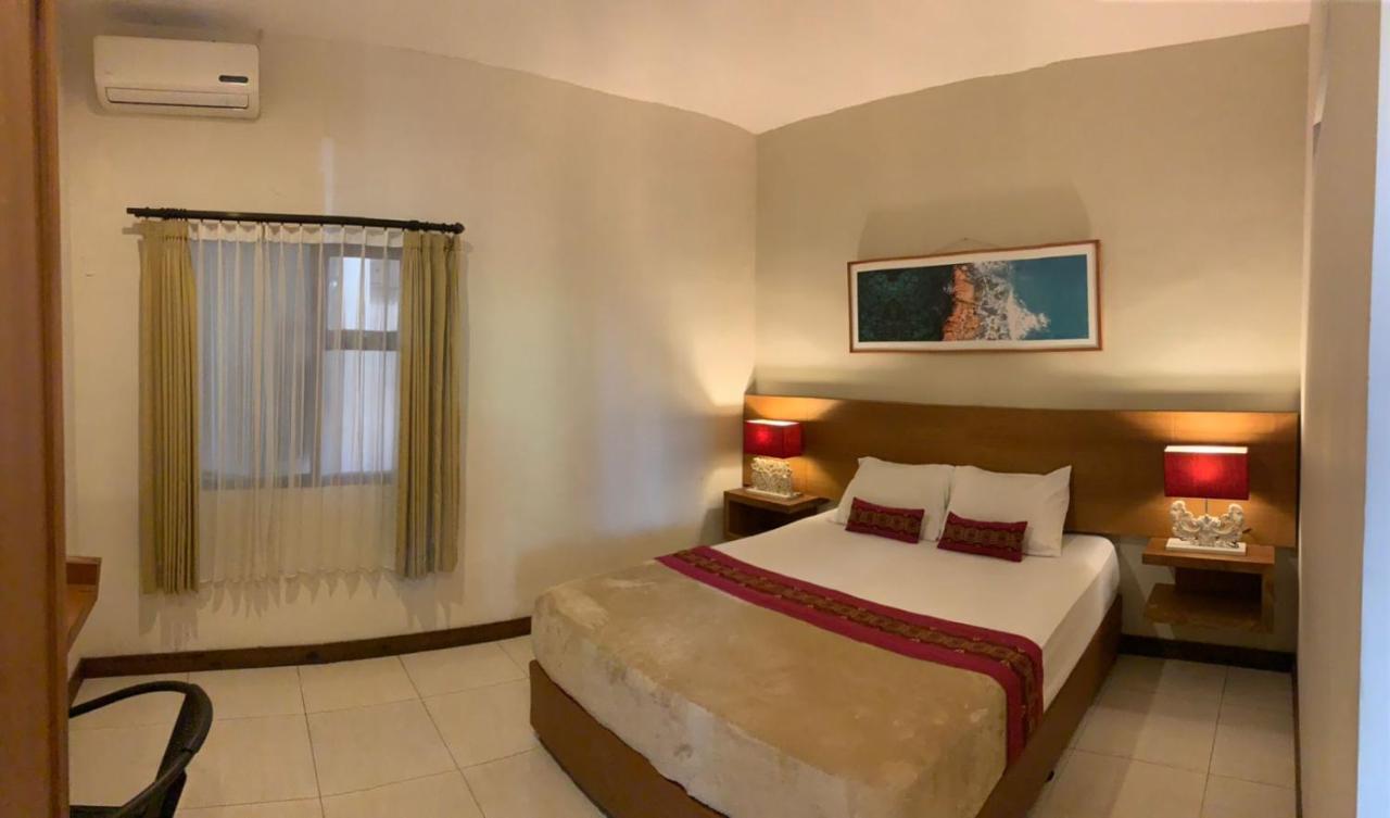 Kuta Suci Guesthouse Екстер'єр фото