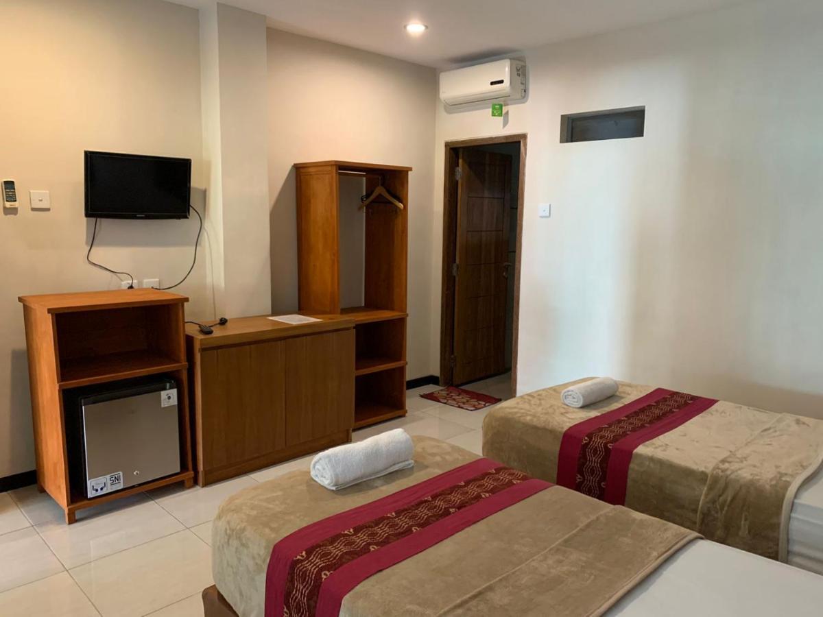 Kuta Suci Guesthouse Екстер'єр фото