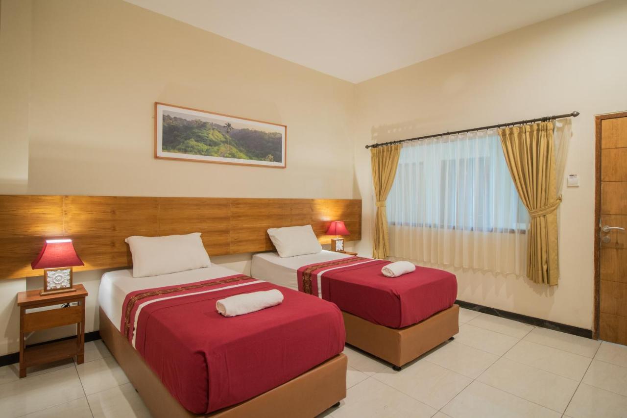 Kuta Suci Guesthouse Екстер'єр фото