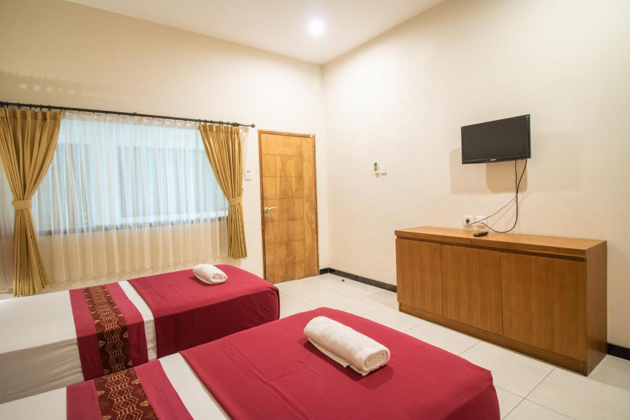 Kuta Suci Guesthouse Екстер'єр фото