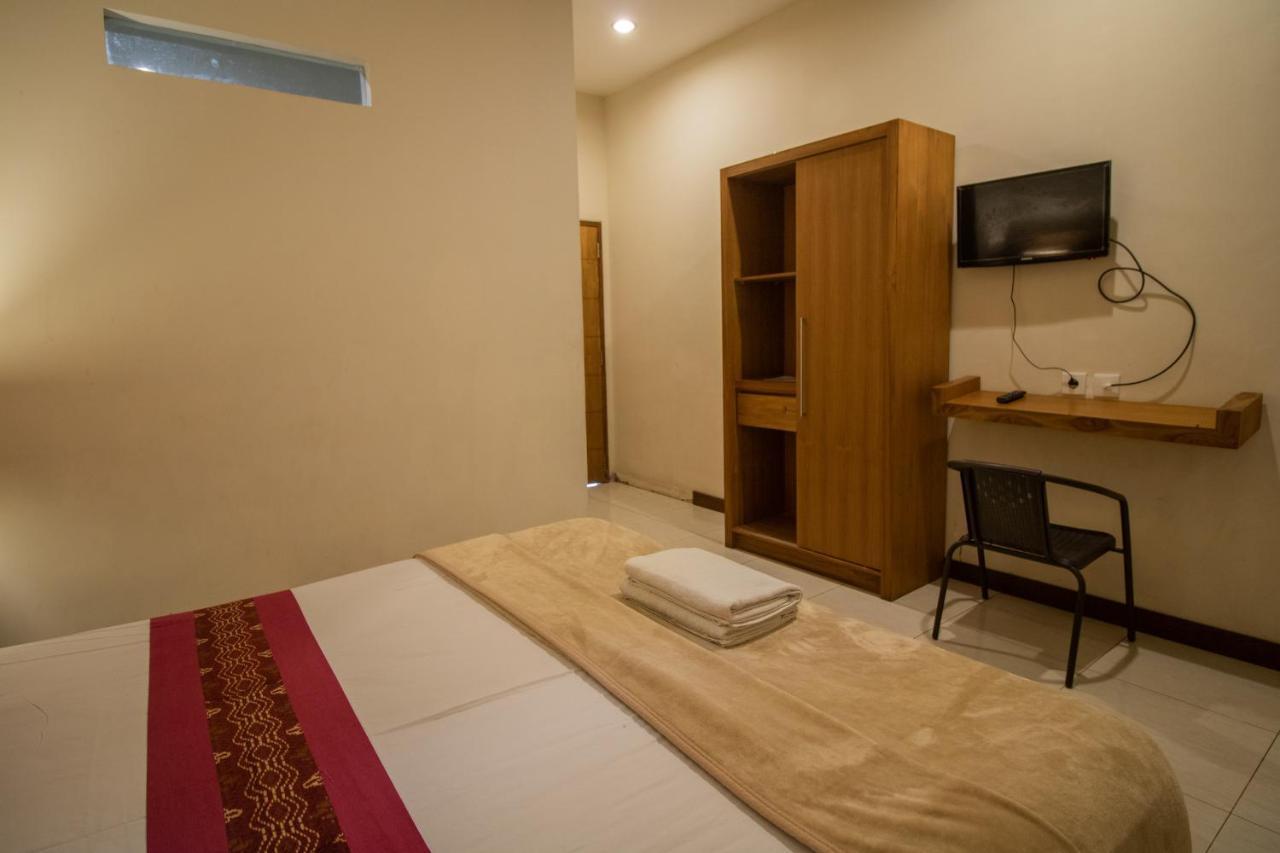Kuta Suci Guesthouse Екстер'єр фото