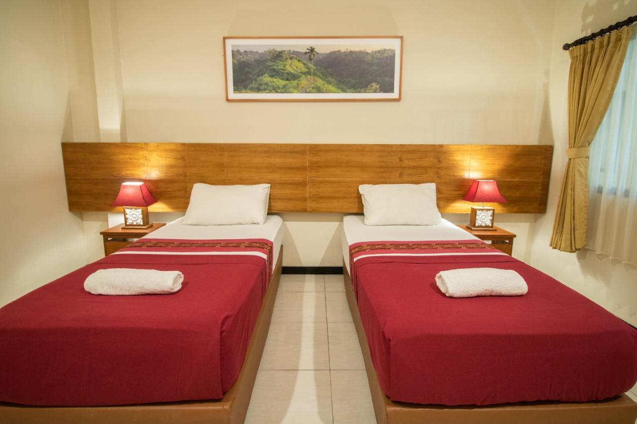 Kuta Suci Guesthouse Екстер'єр фото