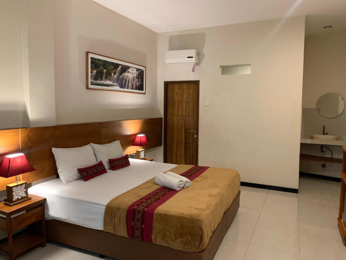 Kuta Suci Guesthouse Екстер'єр фото
