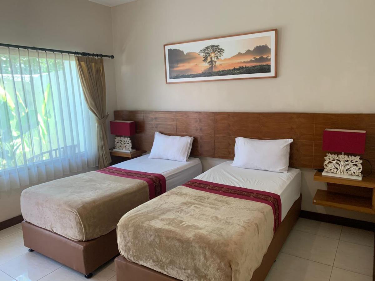 Kuta Suci Guesthouse Екстер'єр фото