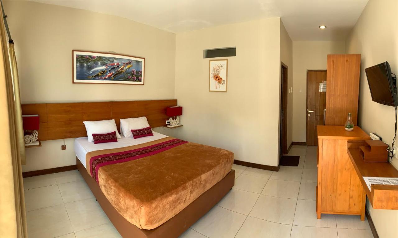 Kuta Suci Guesthouse Екстер'єр фото