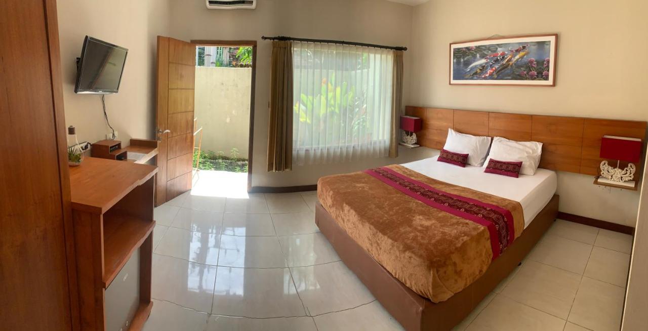 Kuta Suci Guesthouse Екстер'єр фото