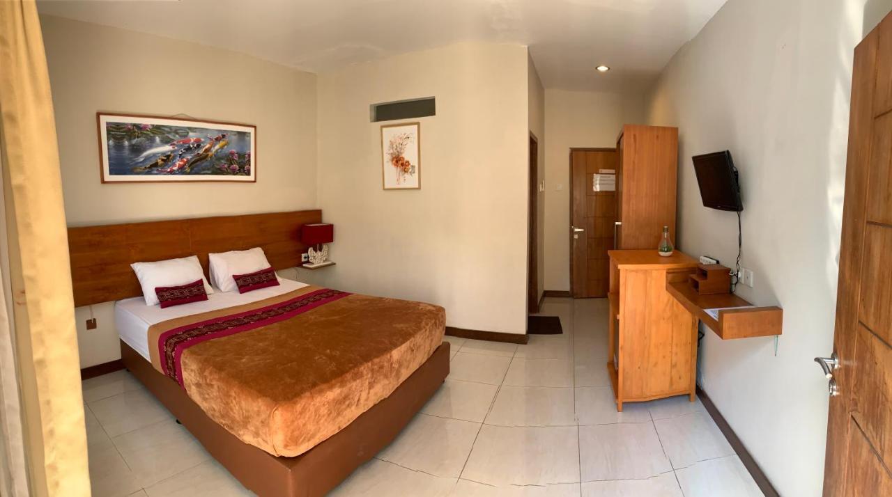 Kuta Suci Guesthouse Екстер'єр фото
