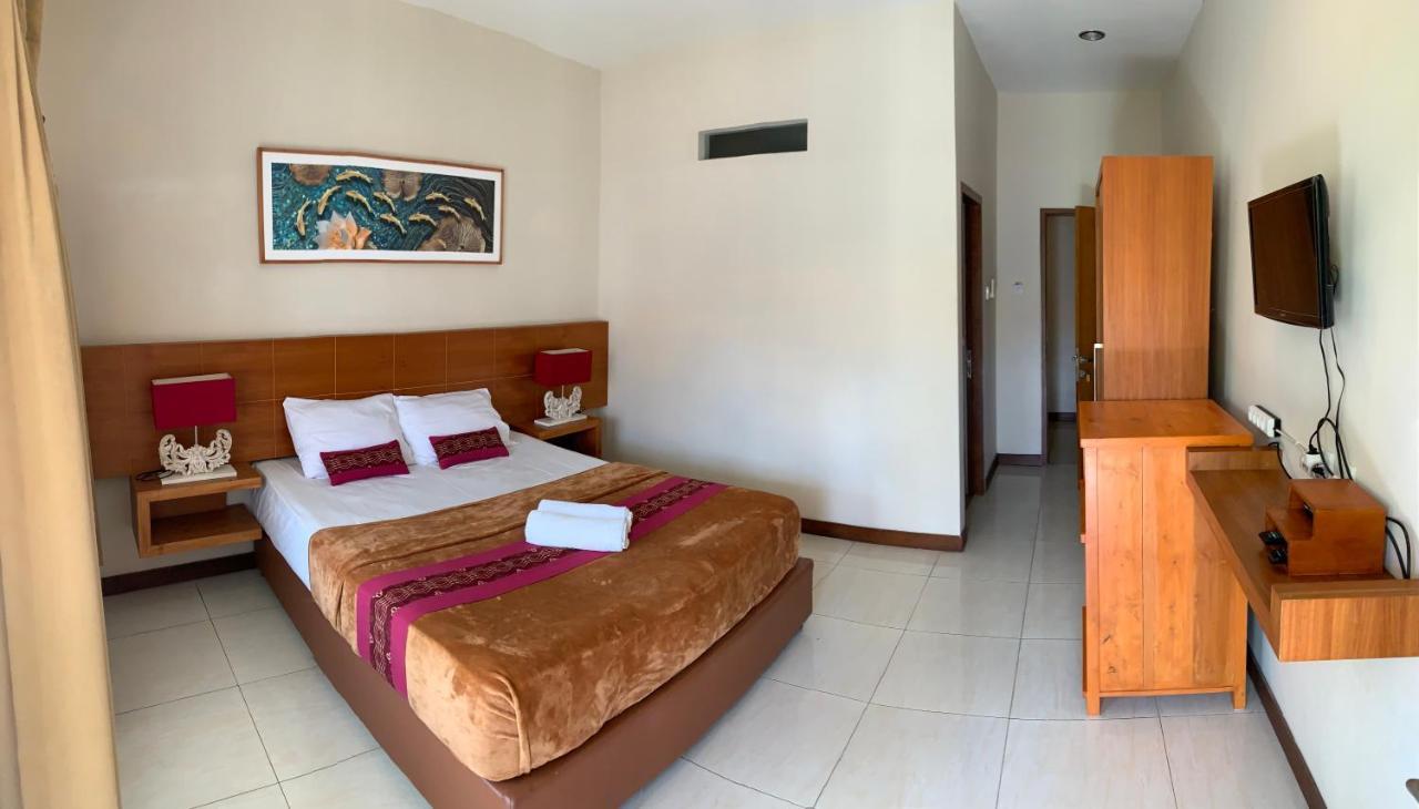 Kuta Suci Guesthouse Екстер'єр фото