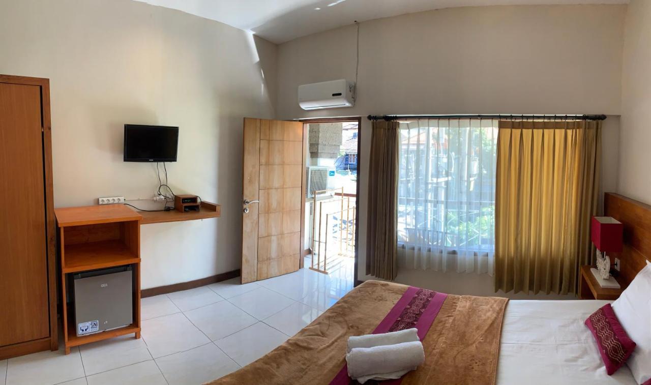 Kuta Suci Guesthouse Екстер'єр фото