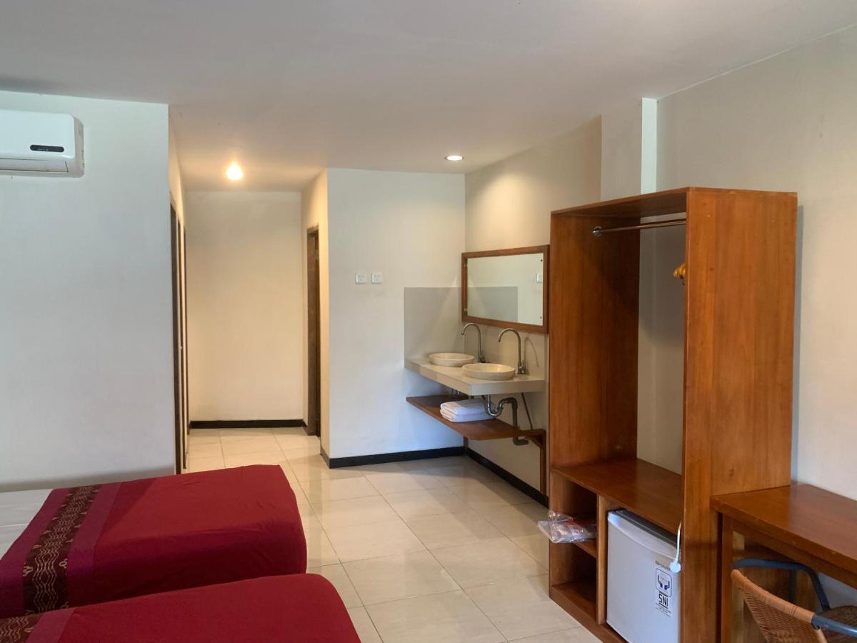 Kuta Suci Guesthouse Екстер'єр фото